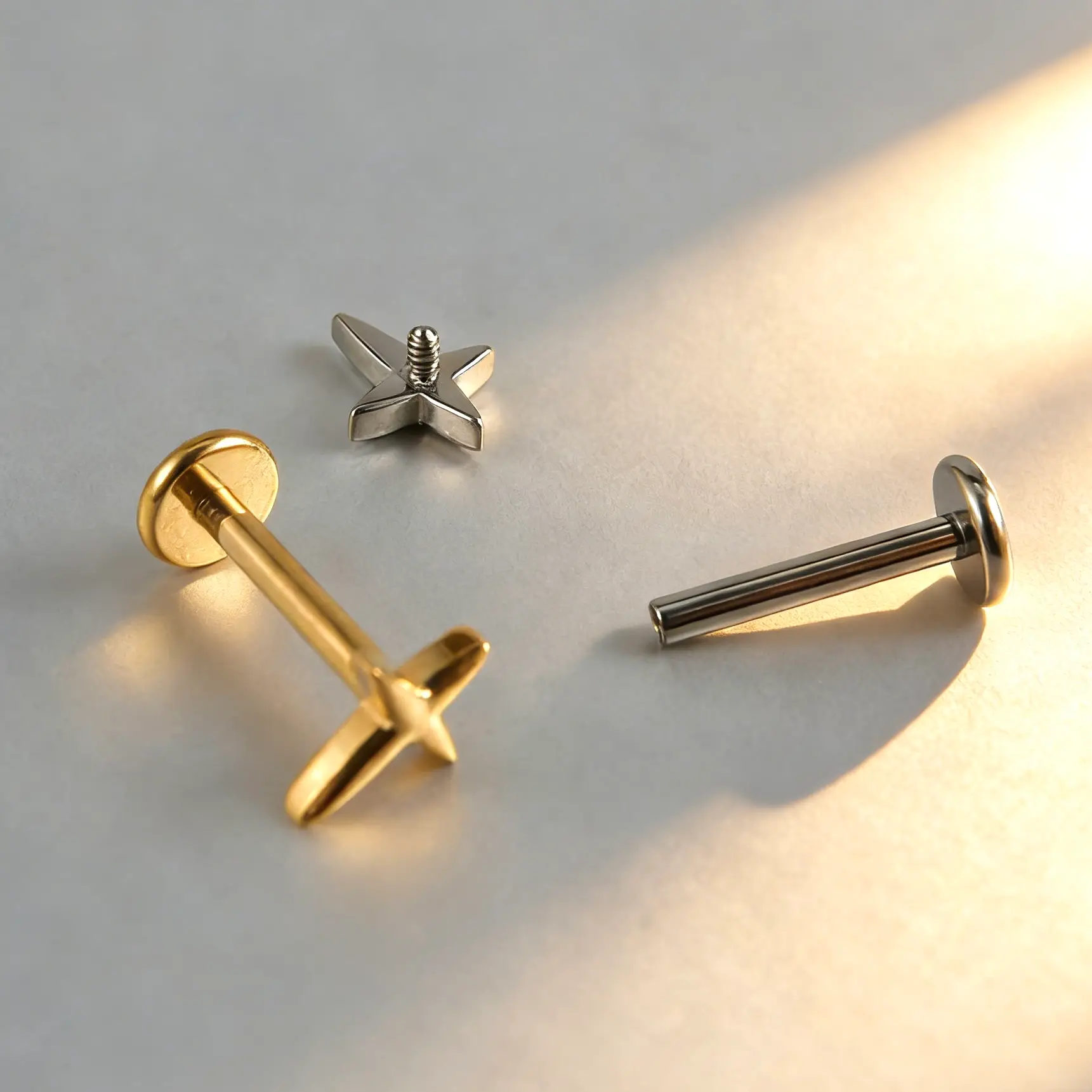 G23 Titanium North Star Cross Labret Stud - Image 1